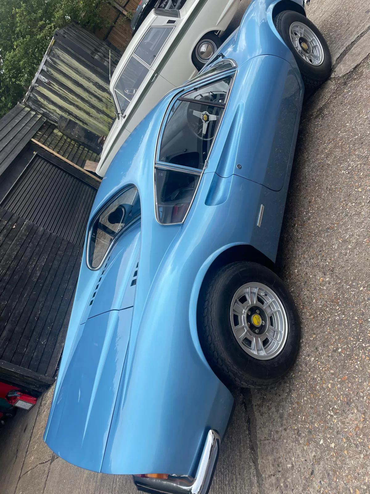 Ferrari Dino 246 GT front three-quarter in the workshop