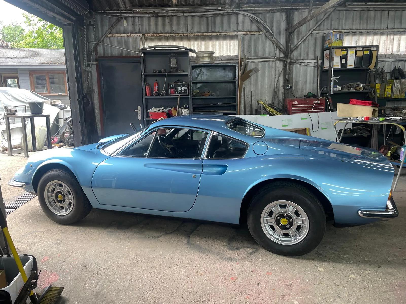 Light blue Ferrari Dino 246 GT in the Welch Automotive workshop